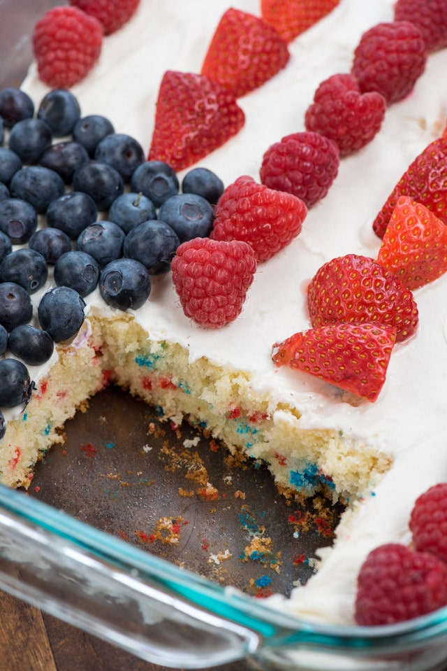 funfetti flag cake with slice missing