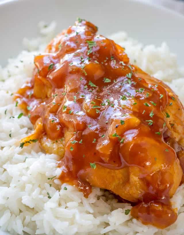 close up of instapot Hawaiian chicken on rice in a white bowl