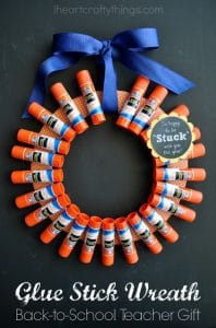 a wreath made out of glue sticks