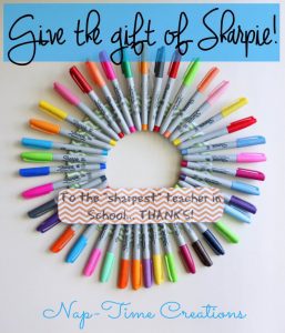a wreath made of different colors of sharpies