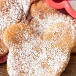 These EASY Beignets start with biscuit dough! They have only 3 ingredients and are the perfect copycat disneyland recipe!