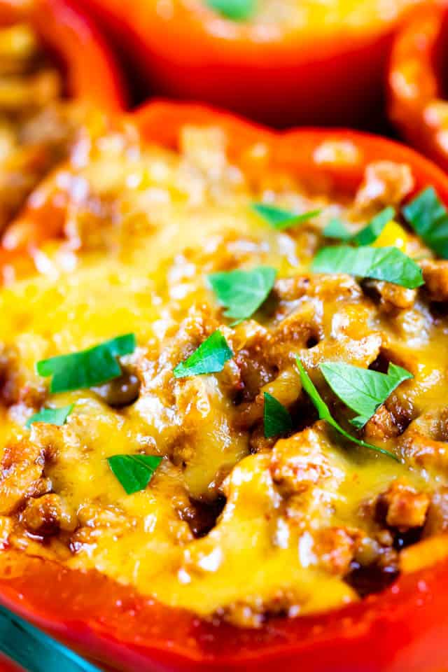 Close up of an enchilada stuffed pepper with cilantro on top