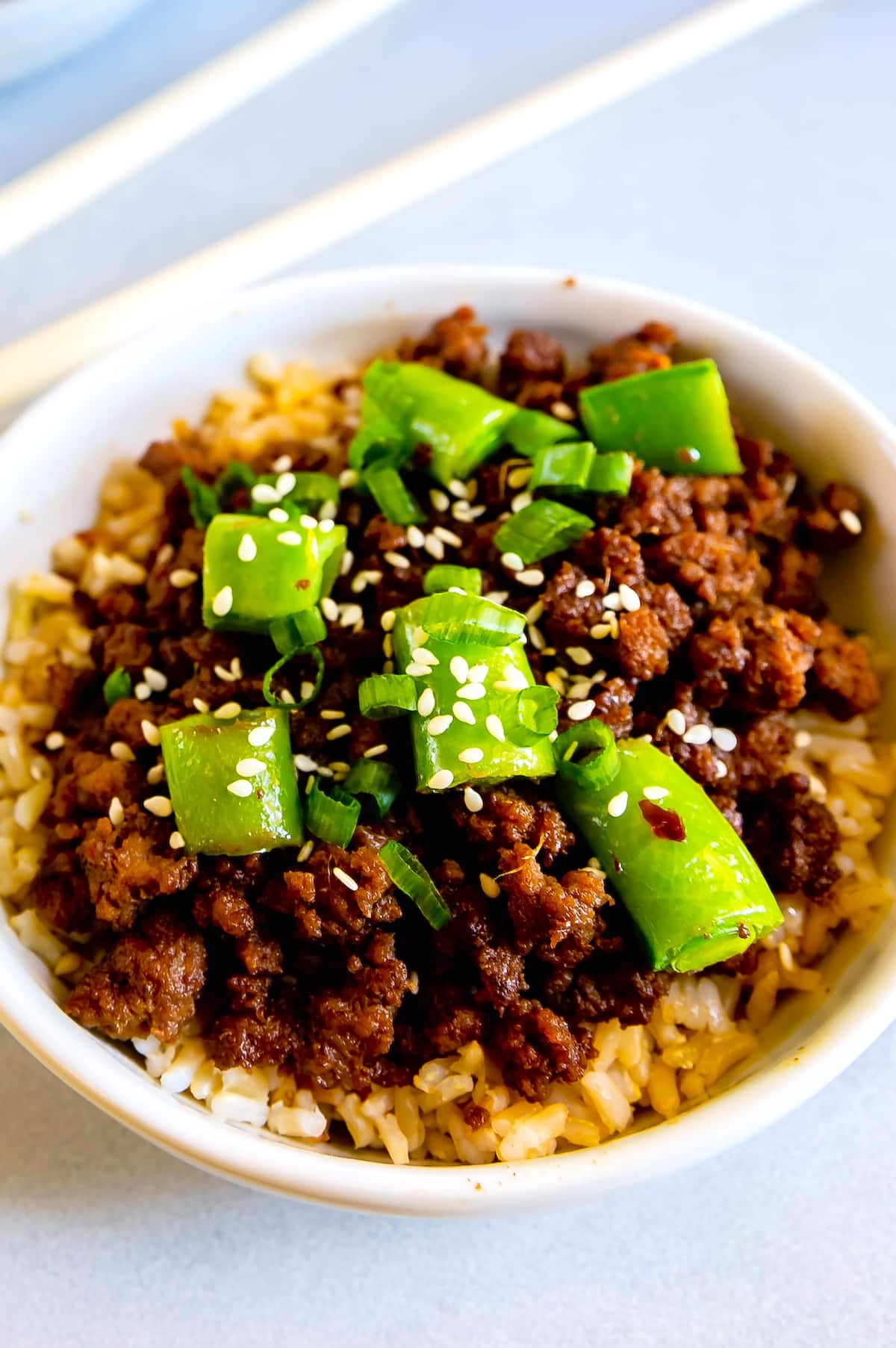 bowl of beef and snap peas.