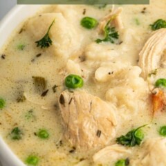 Bowl full of chicken and dumplings with recipe title on top of image
