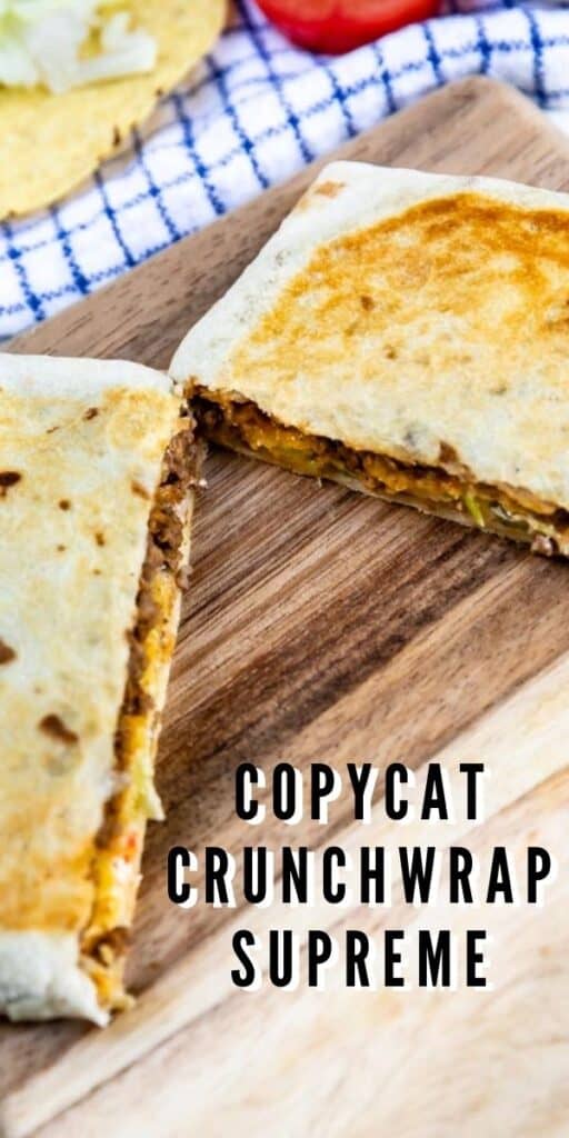 Crunchwrap supreme is cut in half on a wood cutting board with recipe title on bottom of photo