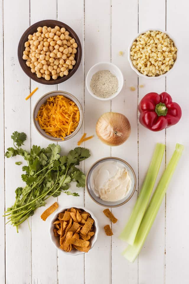 Overhead shot of frito corn salad ingredients on table prior to making