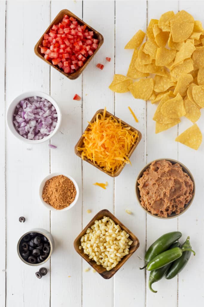 Overhead shot of nachos and toppings
