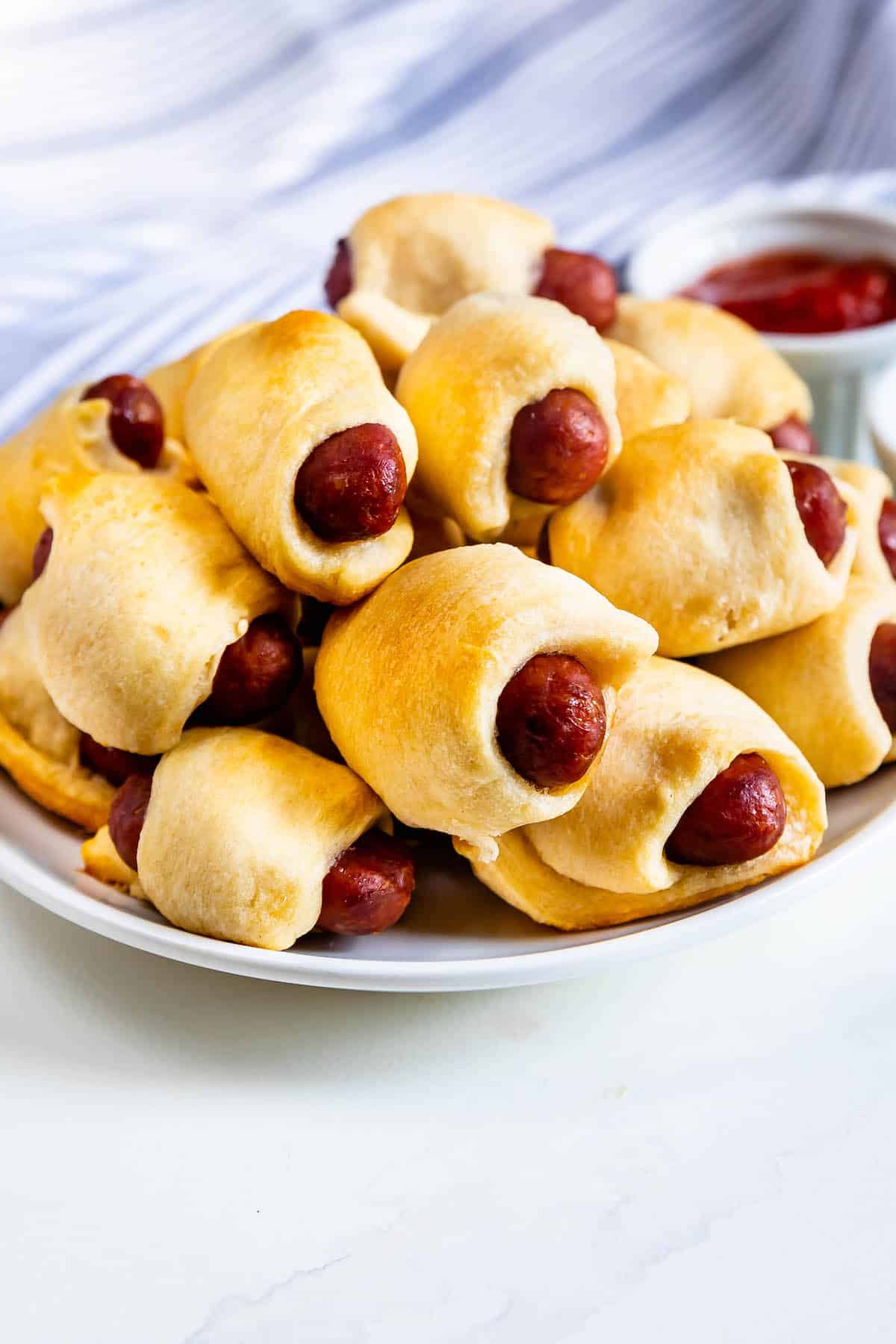 plate of pigs in a blanket