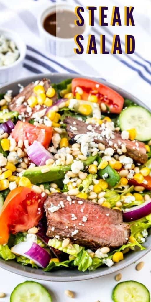 Overhead shot of steak salad in large bowl with recipe title in top right hand corner of photo