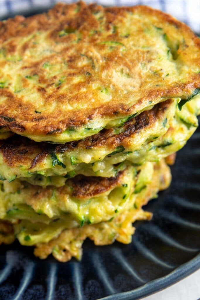 Close up shot of stacked zucchini fritters