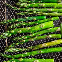Overhead shot of asparagus on the air fryer rack