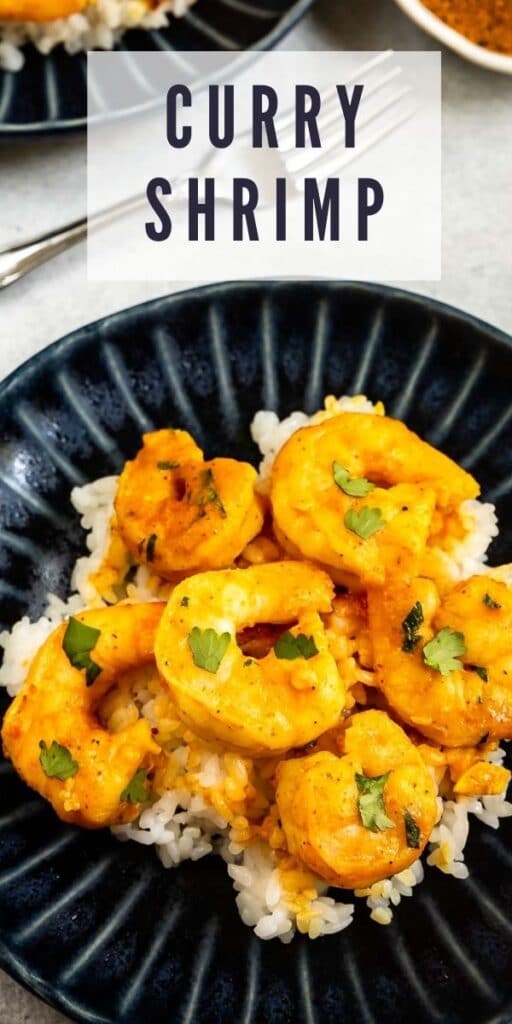 Curry shrimp served over rice with recipe title on bottom of image