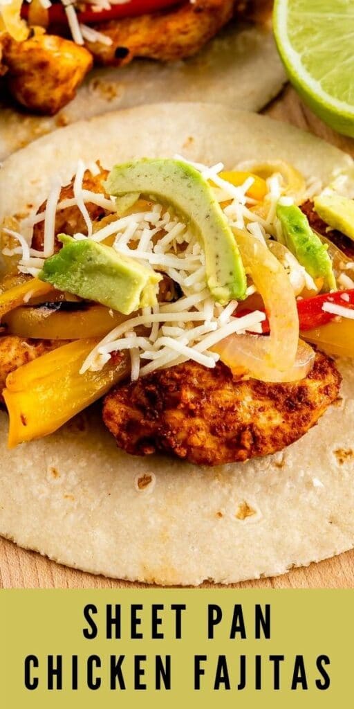 Close up of tortilla filled with sheet pan chicken fajitas, peppers, cheese and avocado and recipe title on bottom of photo