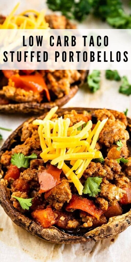 Two taco stuffed portobello mushrooms topped with shredded cheese and recipe title on top of image