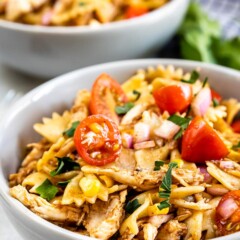 Two bowls full of BBQ chicken pasta salad