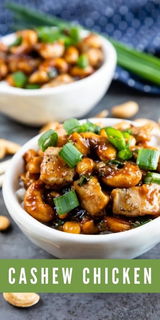 Two bowls of cashew chicken with cashews and chopstix around bowls and recipe title on bottom of photo