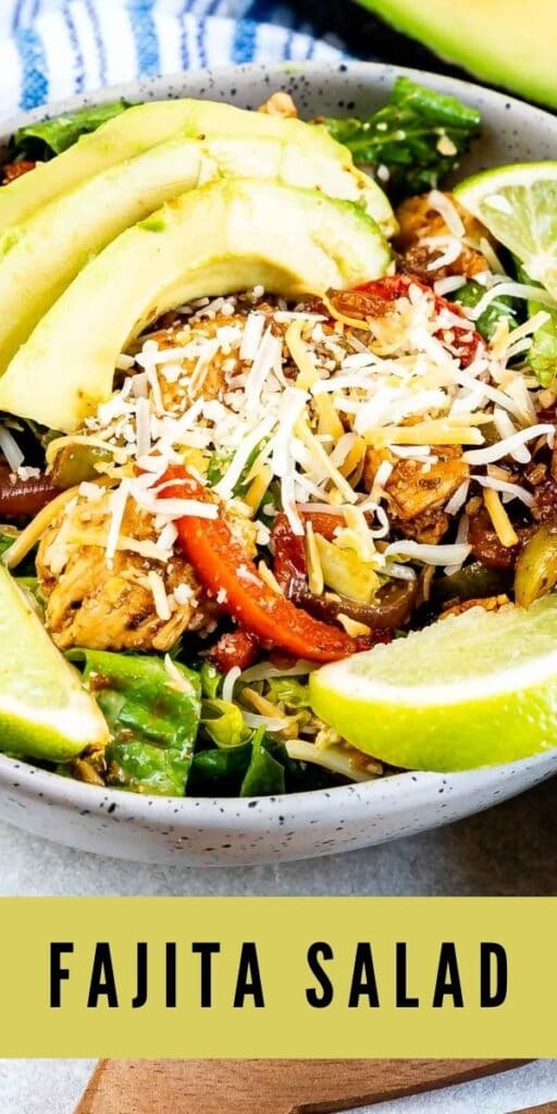 Overhead shot of fajita salad in a salad bowl with recipe title on bottom of photo