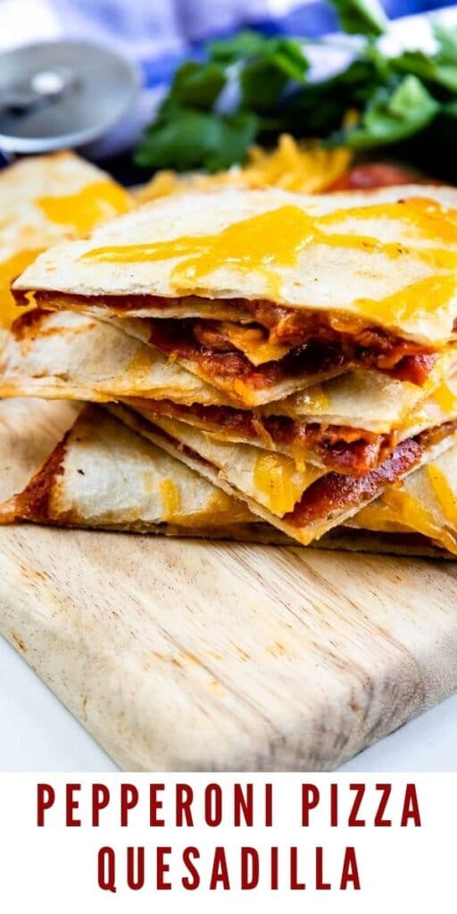 Stack of four pieces of pepperoni pizza quesadillas on a cutting board with recipe title on bottom of image