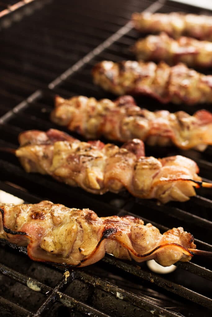 Chicken bacon skewers on the grill