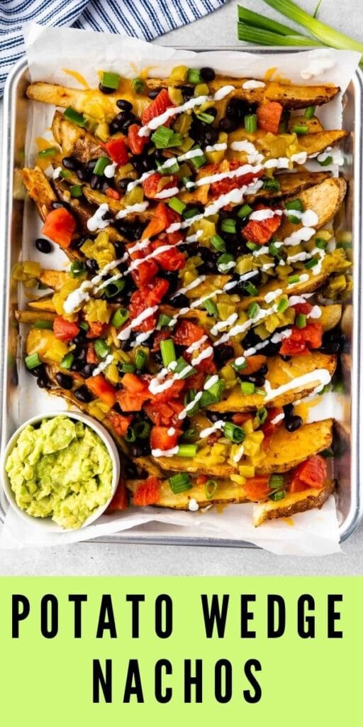 Overhead shot of potato wedge nachos on sheet pan with a side of guacamole and recipe title on bottom of photo