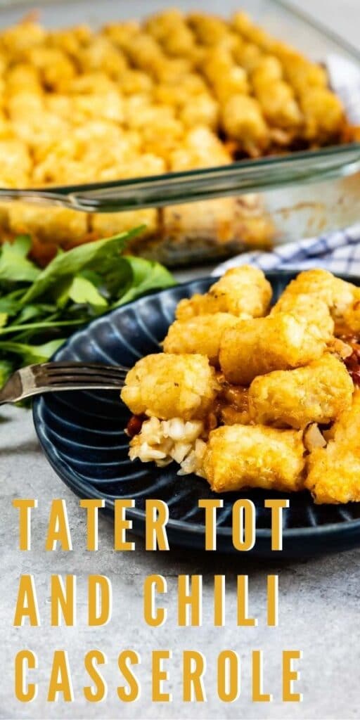 Tater tot and chili casserole on a blue plate with recipe title on bottom of photo