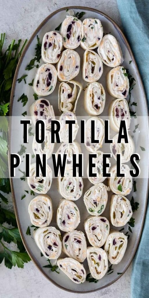 Overhead shot of tortilla pinwheels on serving platter with recipe title in middle of photo