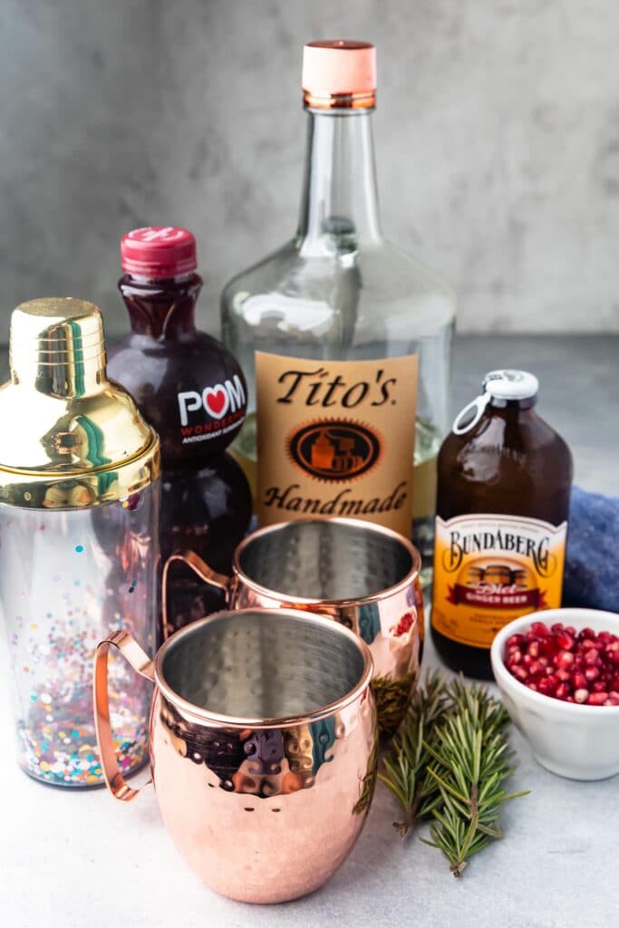 All ingredients needed to make the disney copycat pomegranate mule cocktail