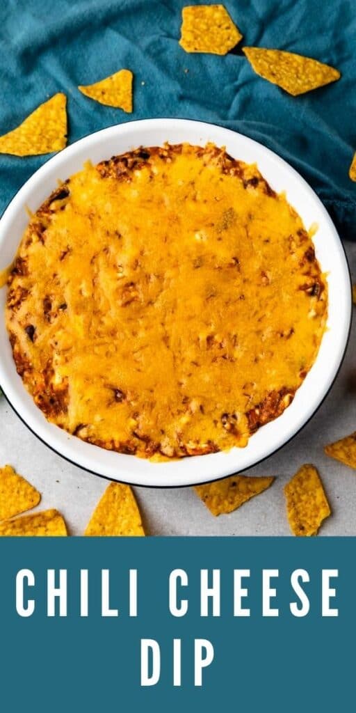 Overhead shot of chili cheese dip in a bowl with recipe title on bottom of photo