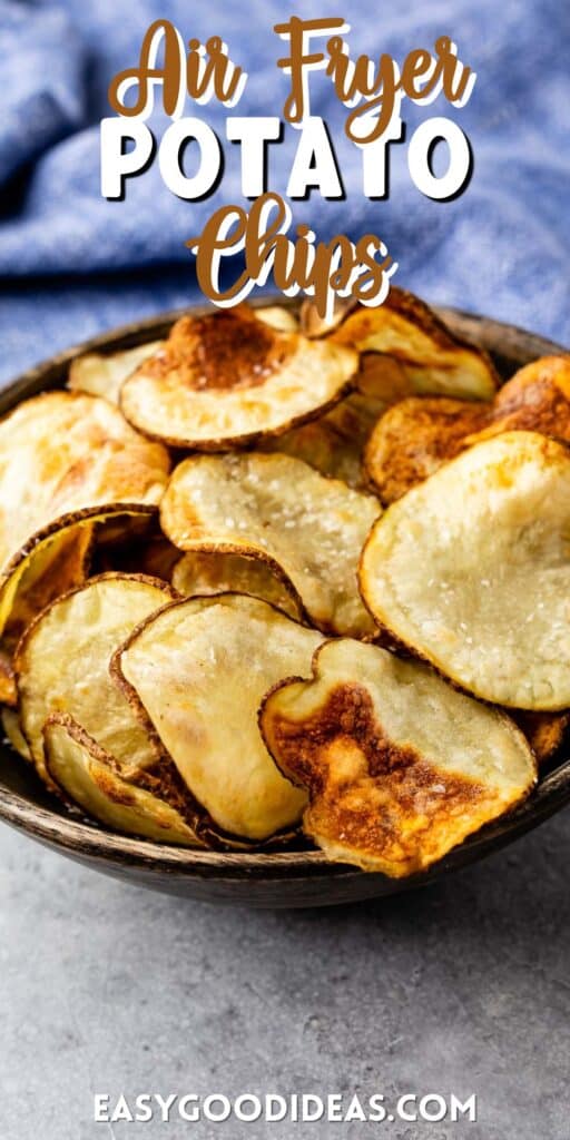 Homemade Potato chips in a wooden bowl