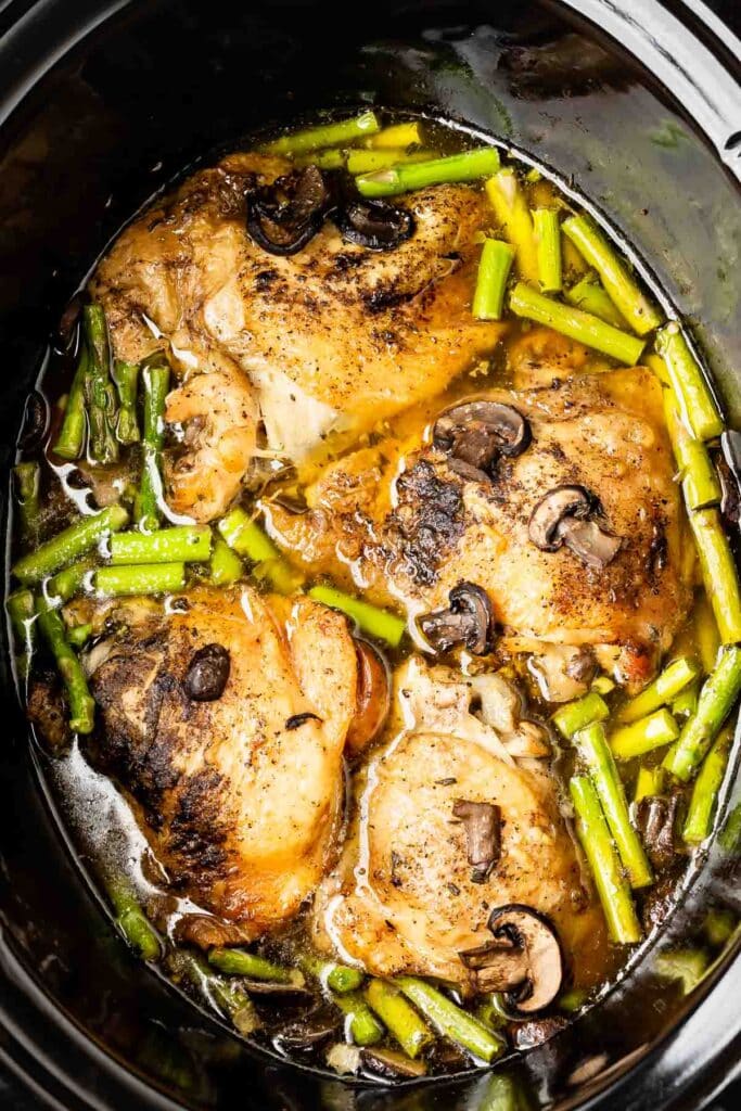 chicken mixed with asparagus and mushrooms.