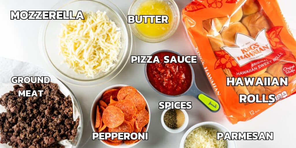 ingredients in pizza sliders laid out on a white counter.