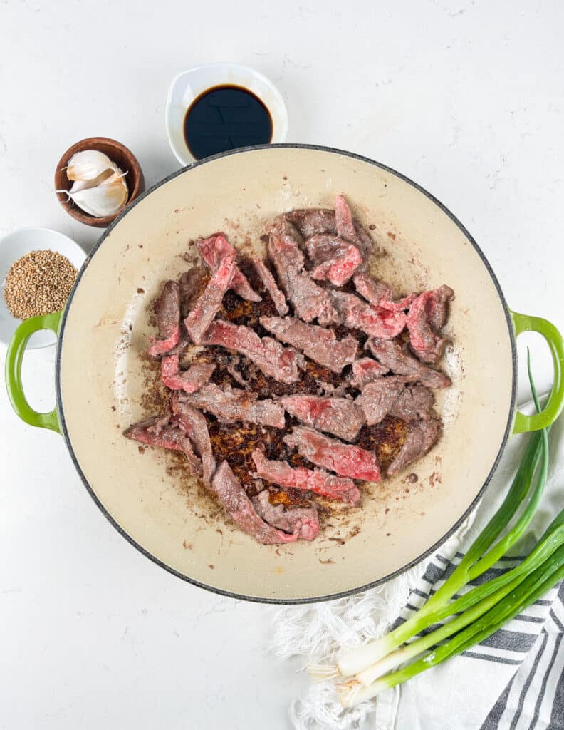 process shot of Mongolian beef being made.