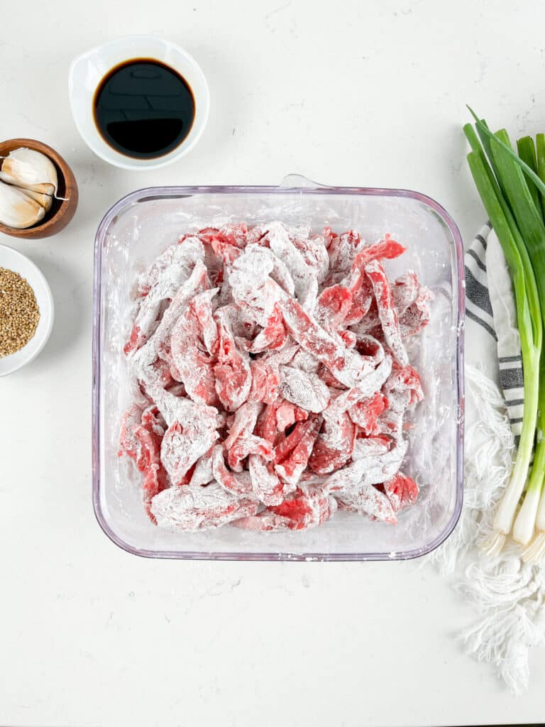 process shot of Mongolian beef being made.