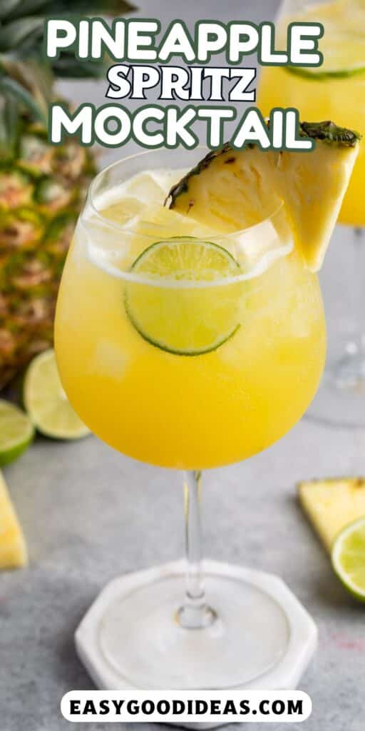 yellow drink in a tall clear glass with a pineapple wedge on the rim with words on the image.