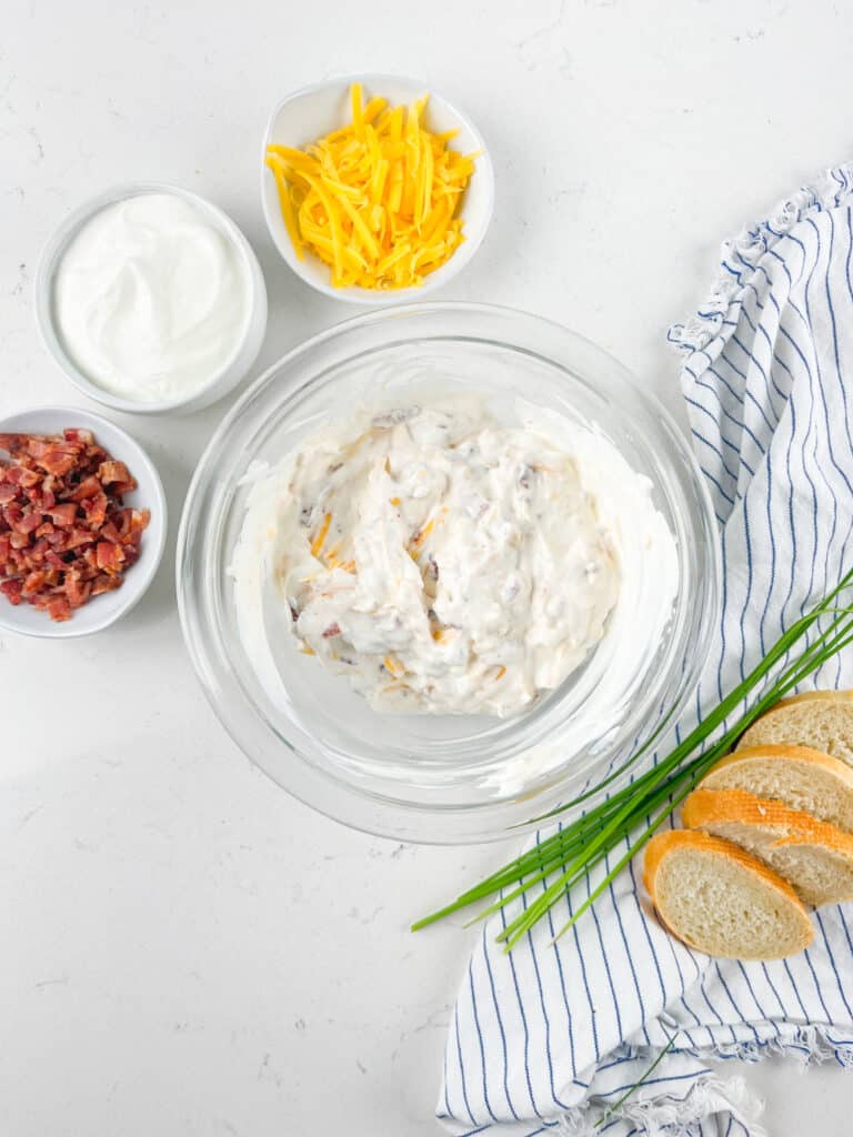 process shot of baked potato dip being made.