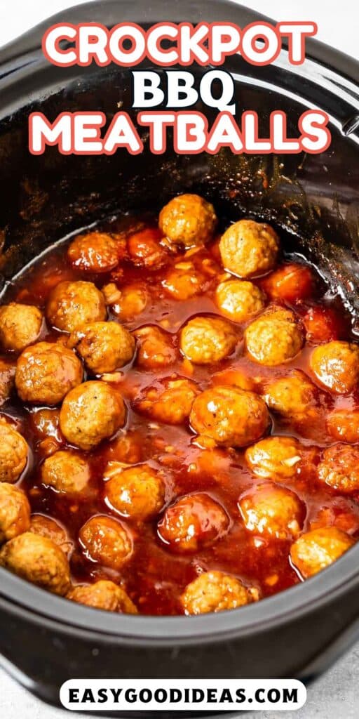 meatballs covered in sauce in a black crockpot with words on the image.