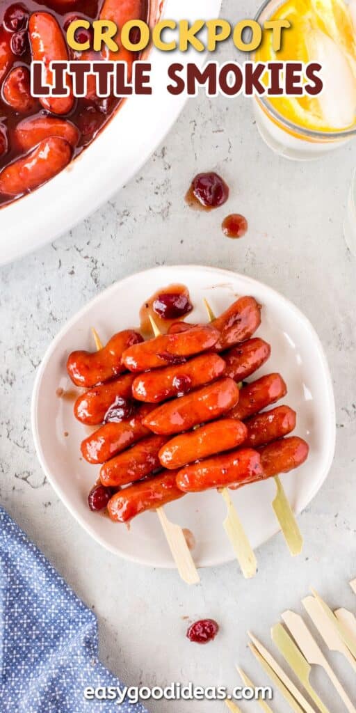 little smokies covered in sauce on a skewer with words on the image.