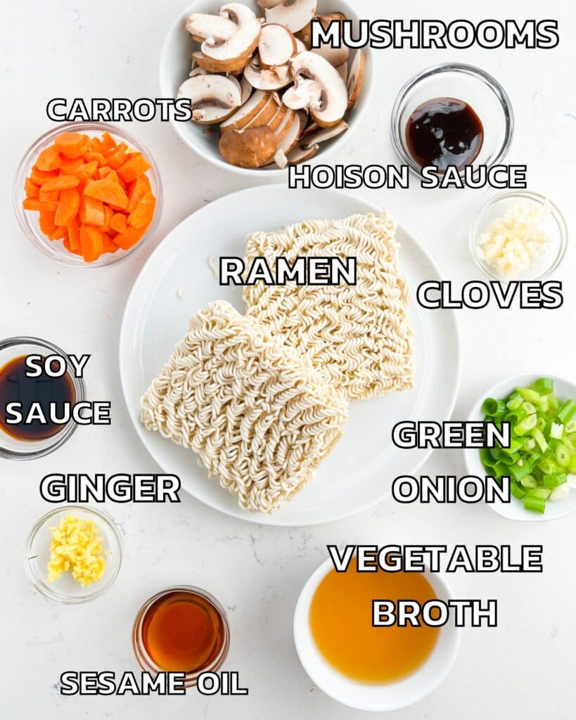 ingredients in vegetable ramen laid out on a white counter.