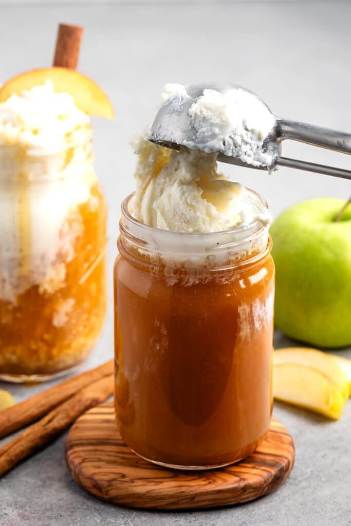 process shot of apple cider float being made.