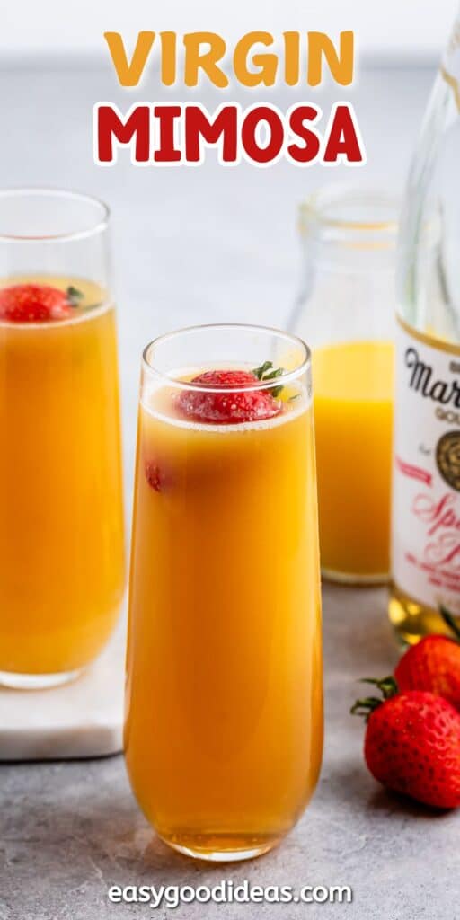 virgin mimosa in a tall clear glass with a strawberry floating in the drink with words on the image.