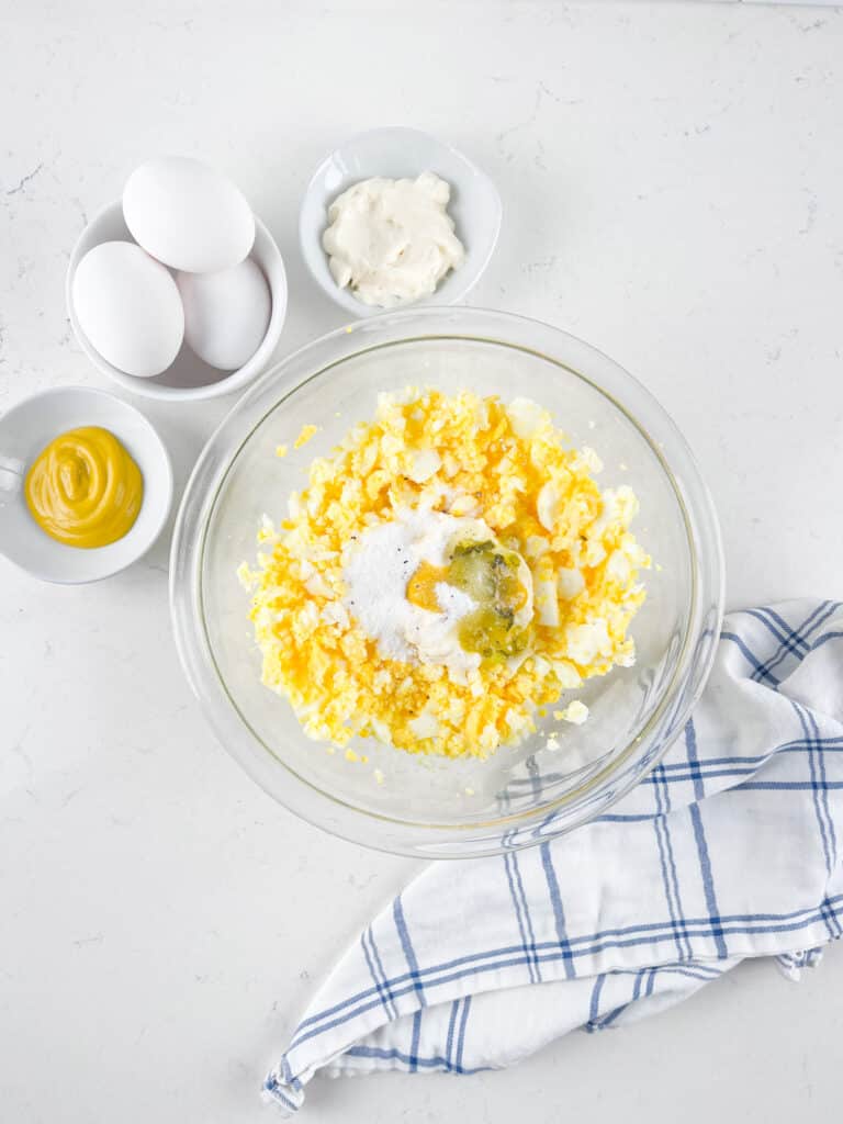 process shot of egg salad being made.