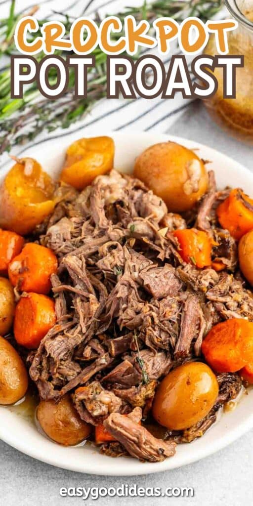 A plate of crockpot pot roast surrounded by cooked carrots and potatoes. The dish is garnished with fresh herbs. Text at the top reads Crockpot Pot Roast, and at the bottom, easygoodideas.com.