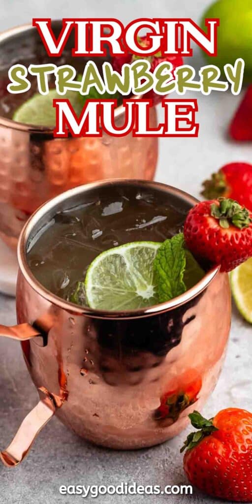 A copper mug filled with Virgin Strawberry Mule, garnished with a lime slice and mint, surrounded by fresh strawberries. Text at the top reads Virgin Strawberry Mule and at the bottom easygoodideas.com.