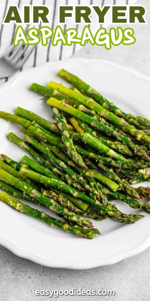 A white plate filled with air-fried asparagus spears, seasoned and arranged neatly. The text Air Fryer Asparagus is at the top, with easygoodideas.com at the bottom.