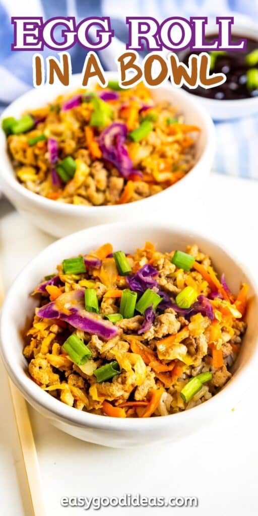 A close-up of two bowls filled with a colorful egg roll in a bowl dish. The dish includes cooked ground meat, shredded carrots, purple cabbage, and chopped green onions. Text at the top reads Egg Roll in a Bowl. At the bottom: easygoodideas.com.