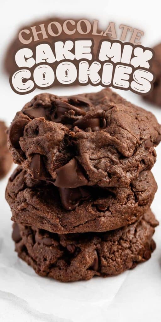 Three thick, chocolatey cookies stacked on a white surface with chocolate chips visible. Above the cookies, bold text reads Chocolate Cake Mix Cookies in playful fonts.