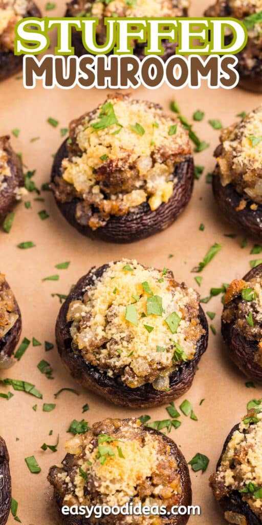 Overhead view of baked stuffed mushrooms topped with breadcrumbs and herbs, arranged on brown parchment paper. The text Stuffed Mushrooms appears at the top and easygoodideas.com at the bottom.
