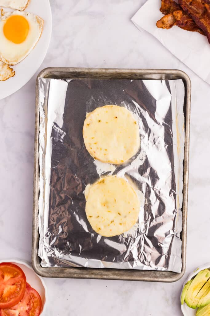 English muffin topped with cheese.
