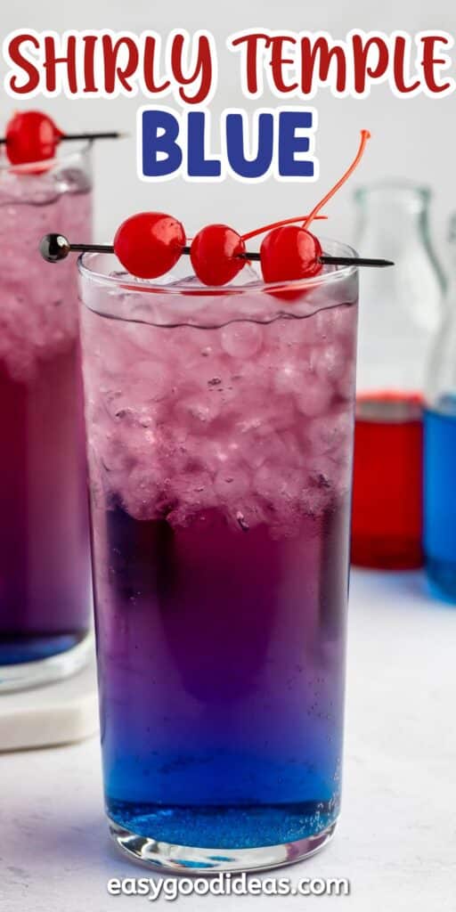 A tall glass filled with ice and a layered blue and purple drink, garnished with three maraschino cherries on a skewer. Shirly Temple Blue is written at the top, with colorful bottles in the background.