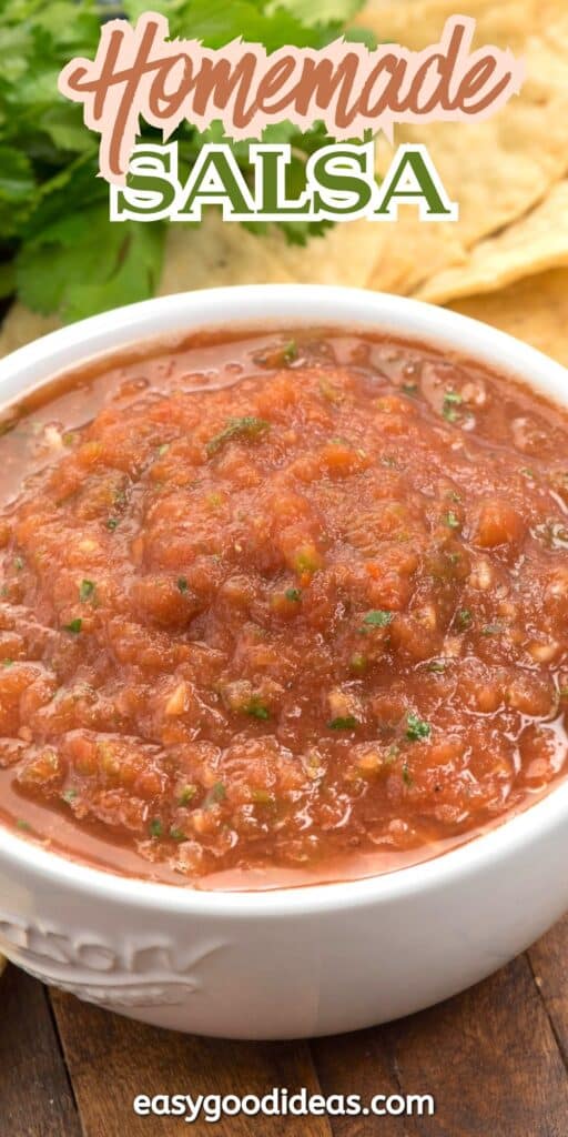 A white bowl filled with chunky homemade salsa sits on a wooden surface, with tortilla chips and fresh cilantro visible in the background. The text Homemade Salsa appears at the top, and easygoodideas.com at the bottom.